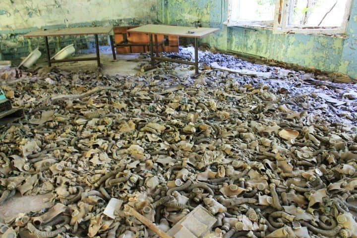 creepy room filled with gas masks creepy room filled with gas masks