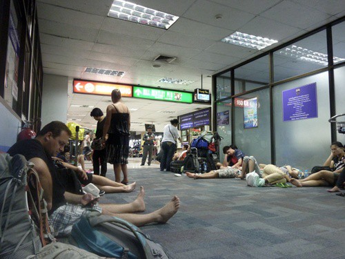 phuket airport sleeping people