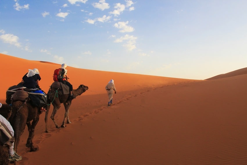 camel riding sahara desert morocco