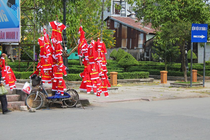 santa outfits on a bicycle
