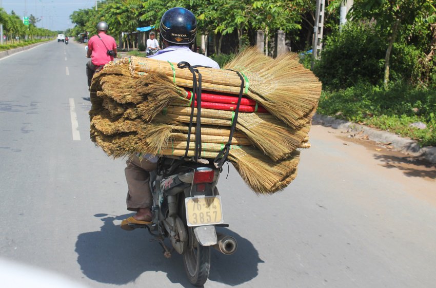 brooms on a scooter