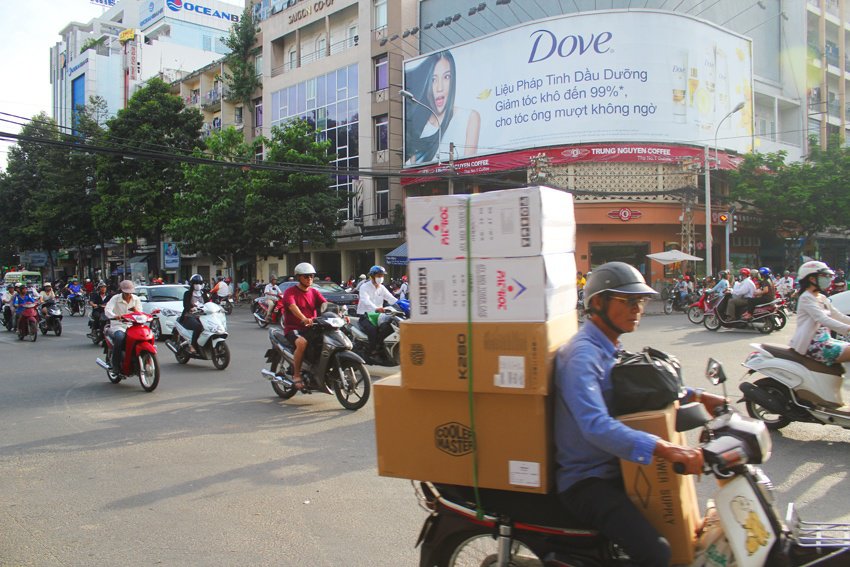 boxes on a scooter in saigon