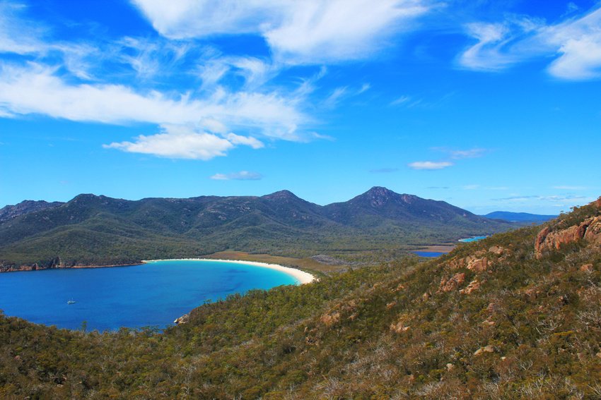 View of Wineglass Bay from lookout on sunny day