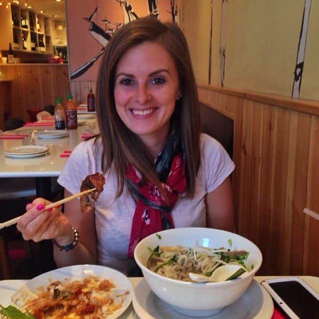 Lauren eating Vietnamese food in London