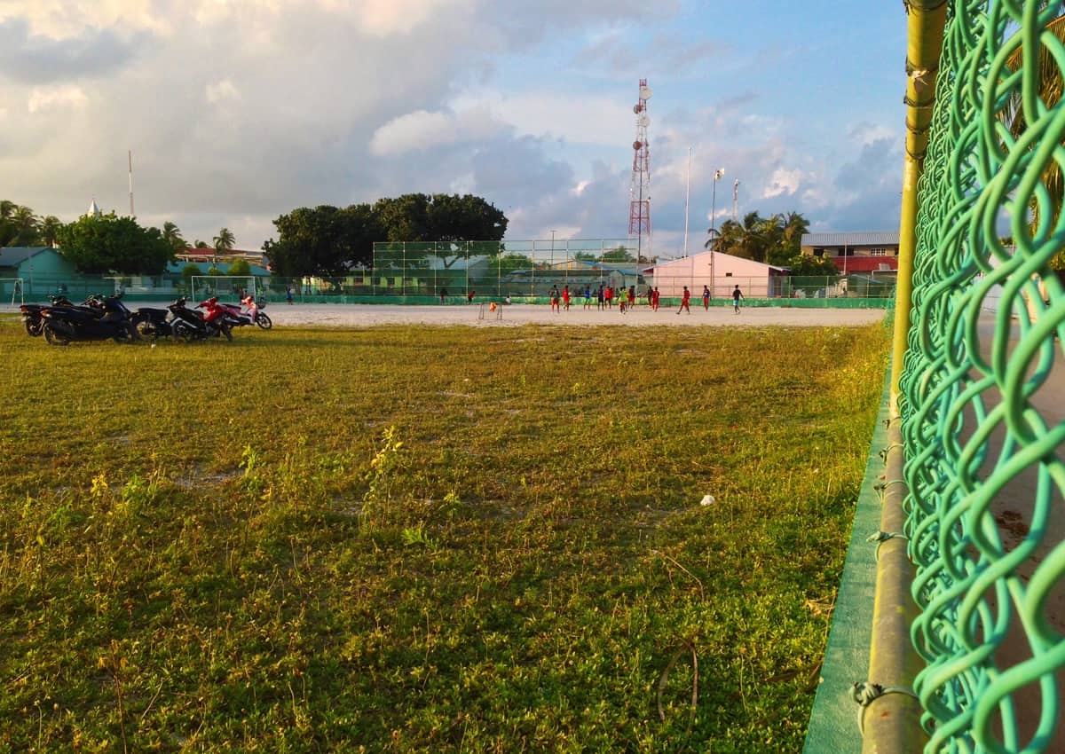 A football game taking place on the opposite side of the island