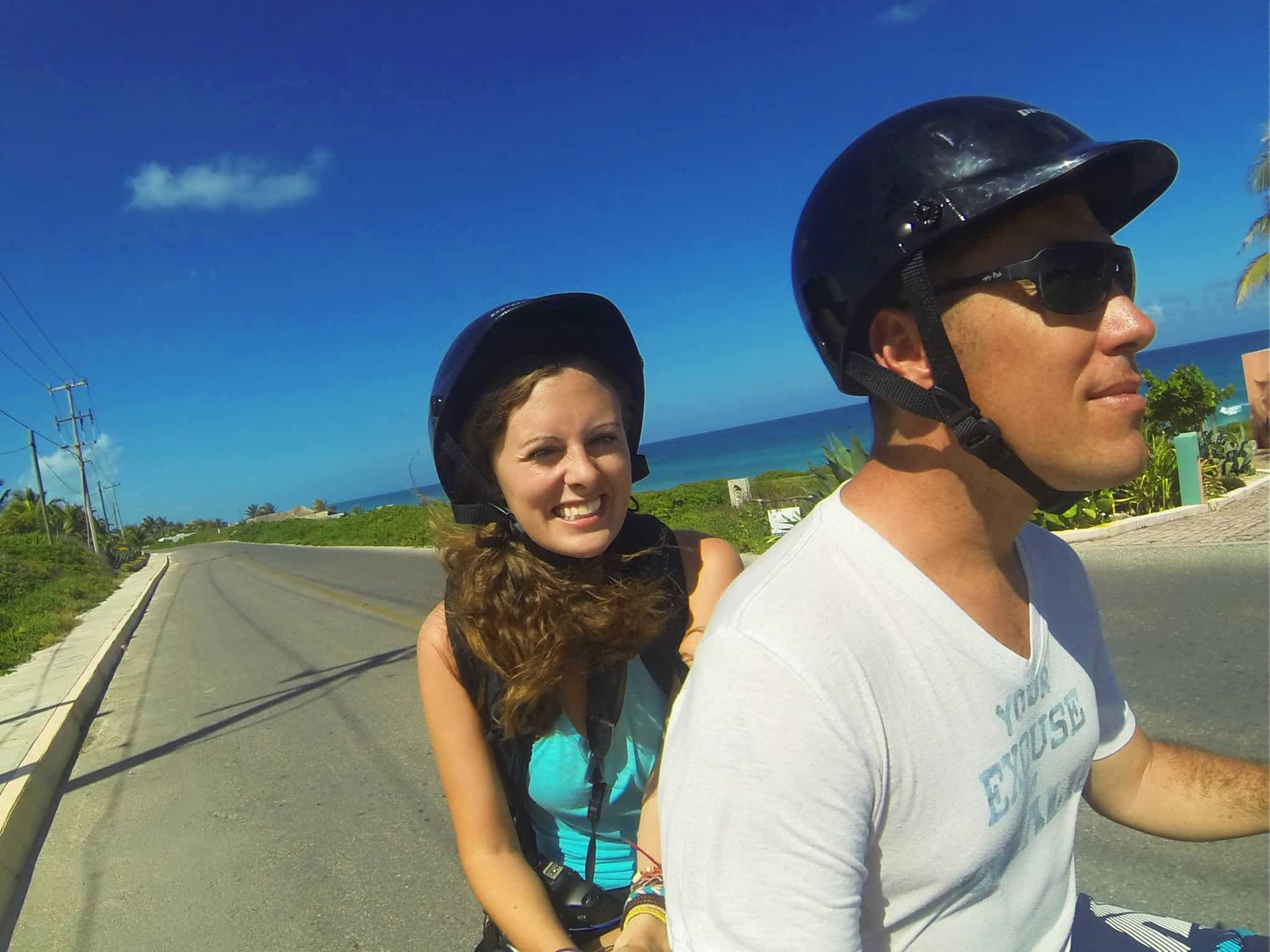 Lauren and Dave on a scooter in Isla Mujeres