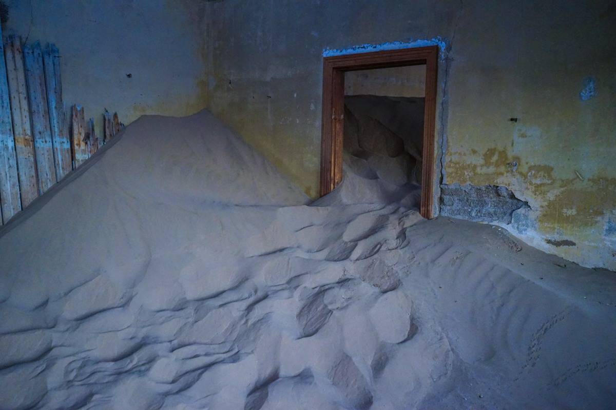 Sand dune inside room at Kolmanskop
