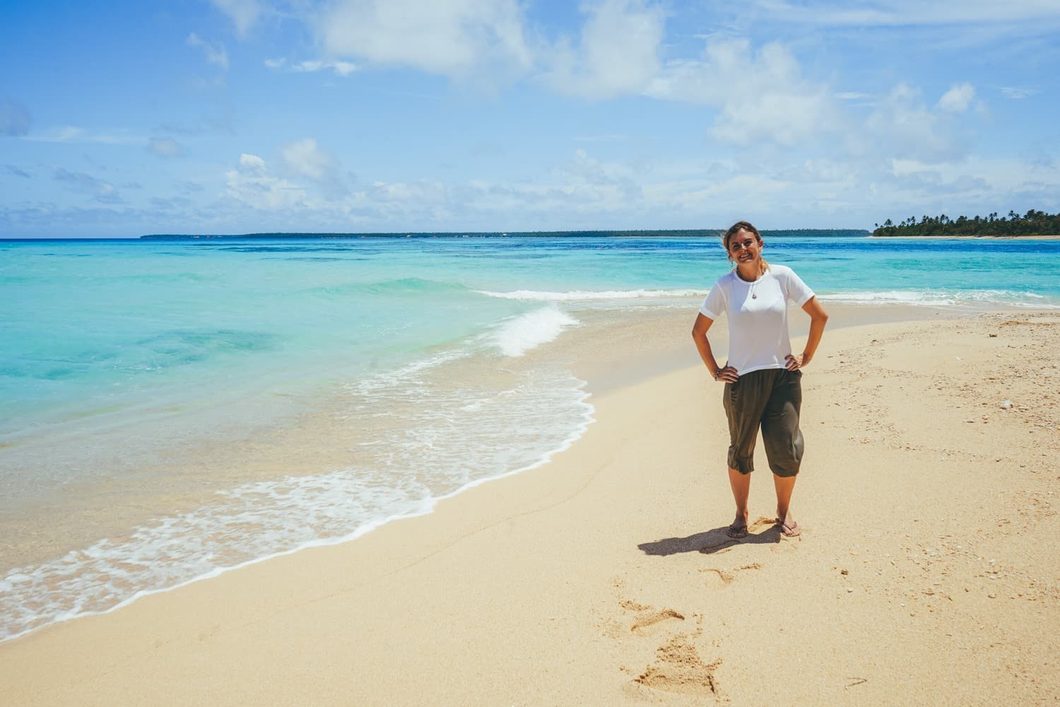 Girl on beach in Tonga