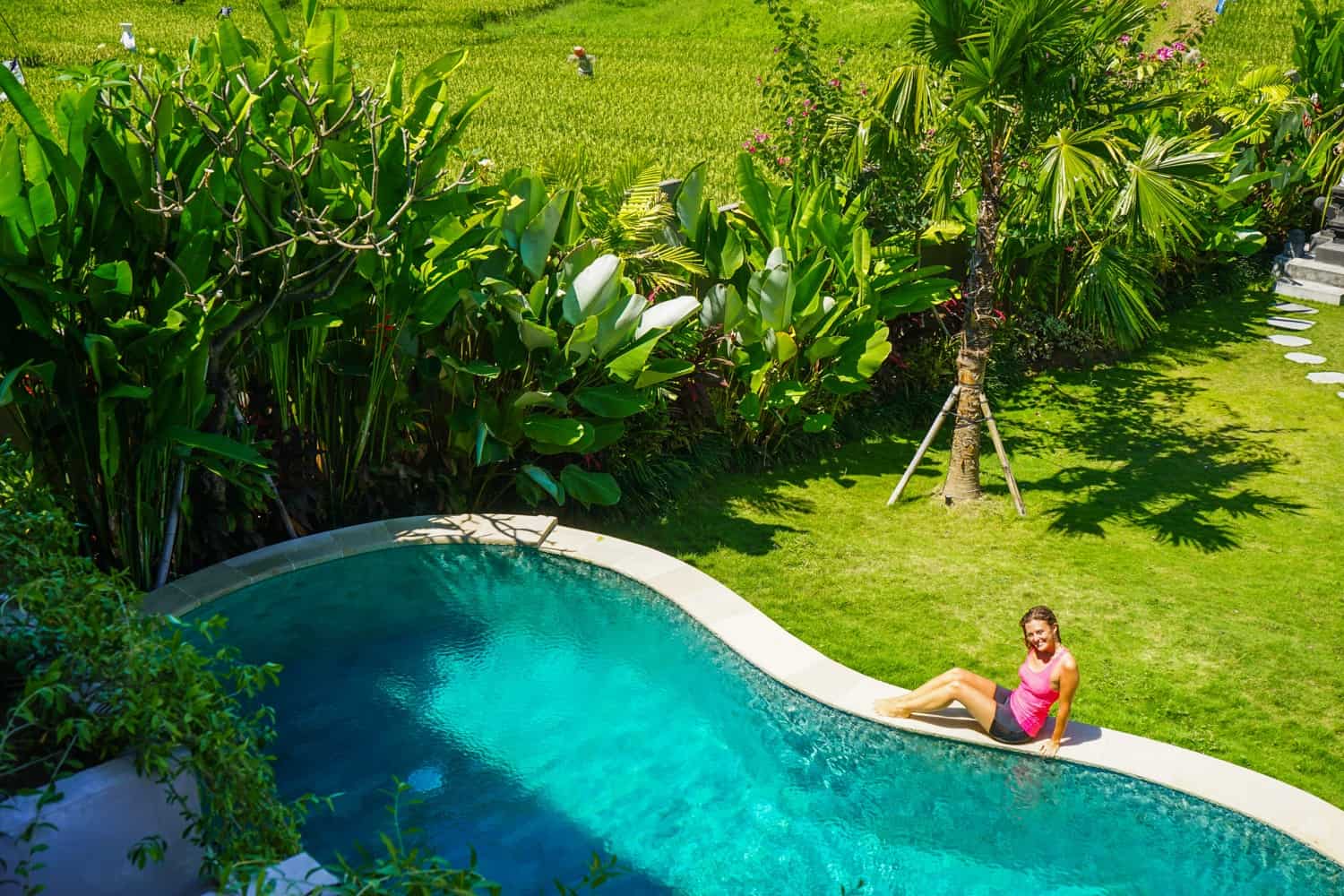 Girl next to pool at Bali villa