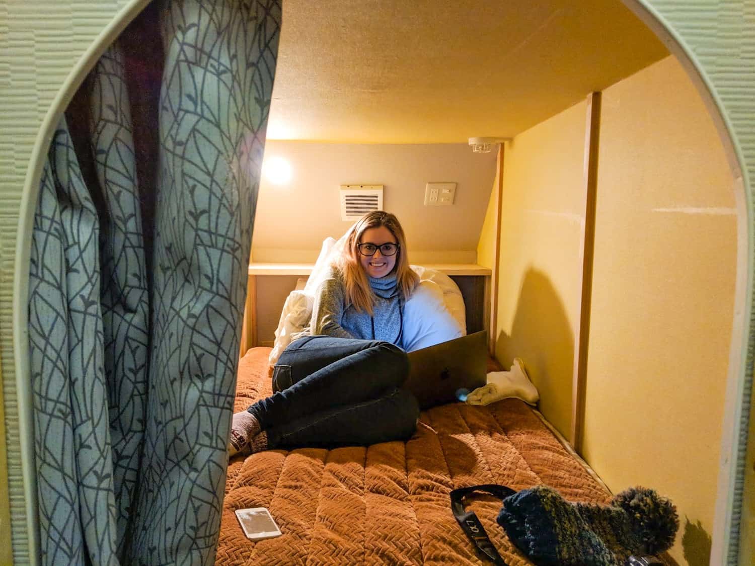 Girl in a capsule hotel in Japan