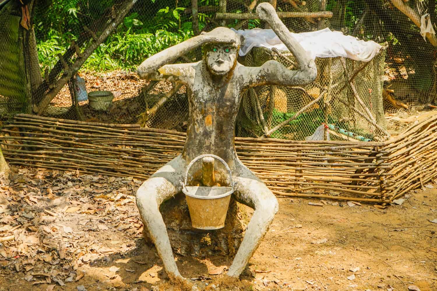 Erotic stone monkey sculpture