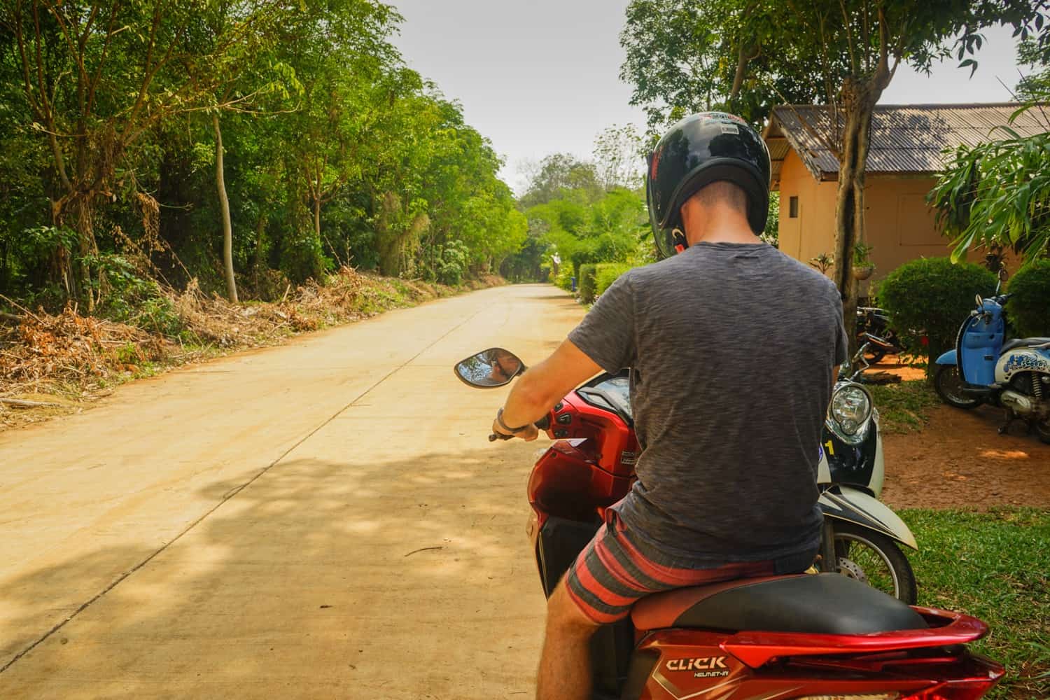 Man on motorbike in Thailand