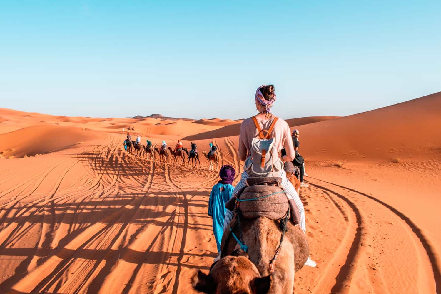 Sahara desert girl on camel