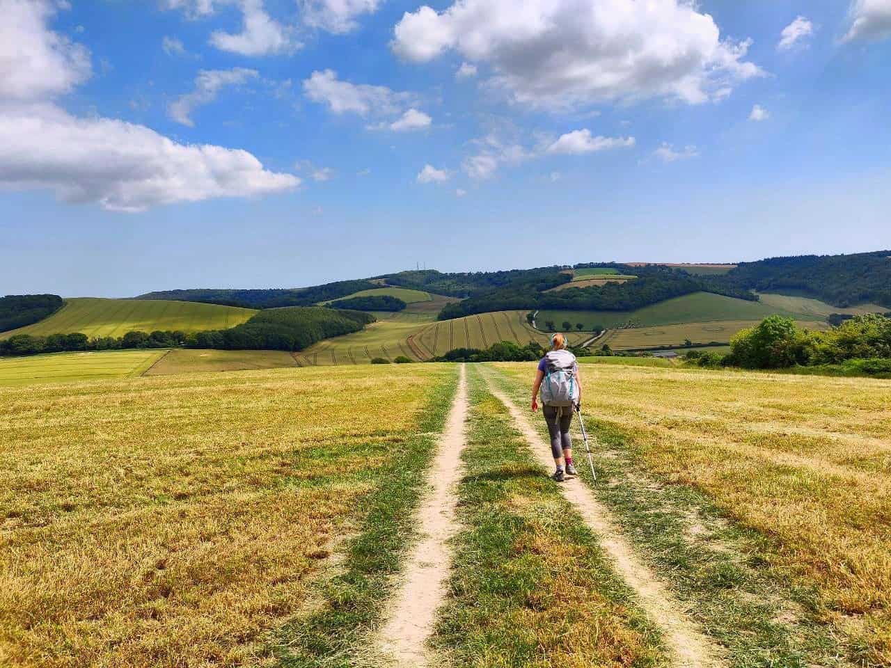 Girl walking in British countryside