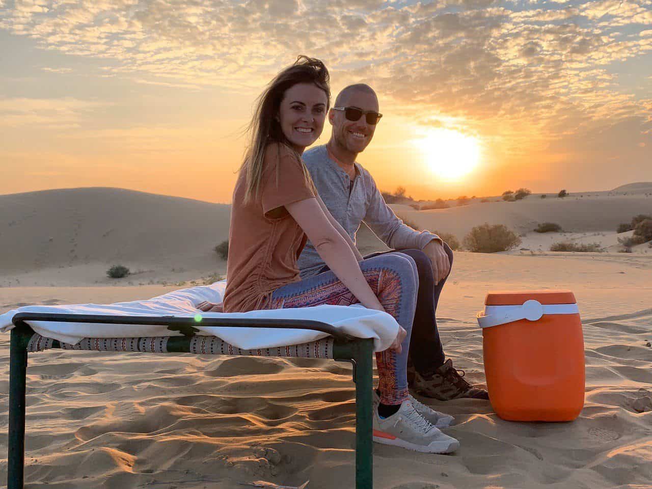 couple in indian desert at sunset