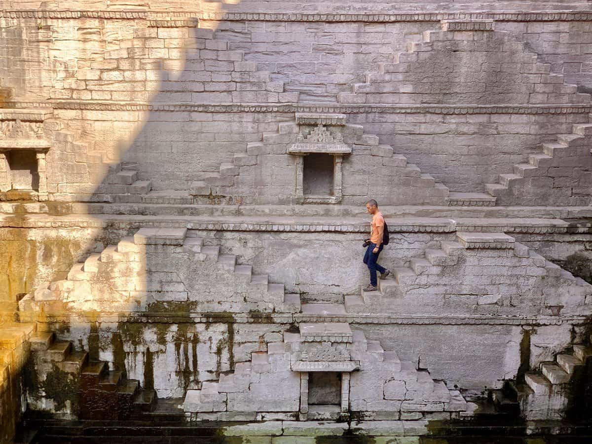 man walking in stepwell