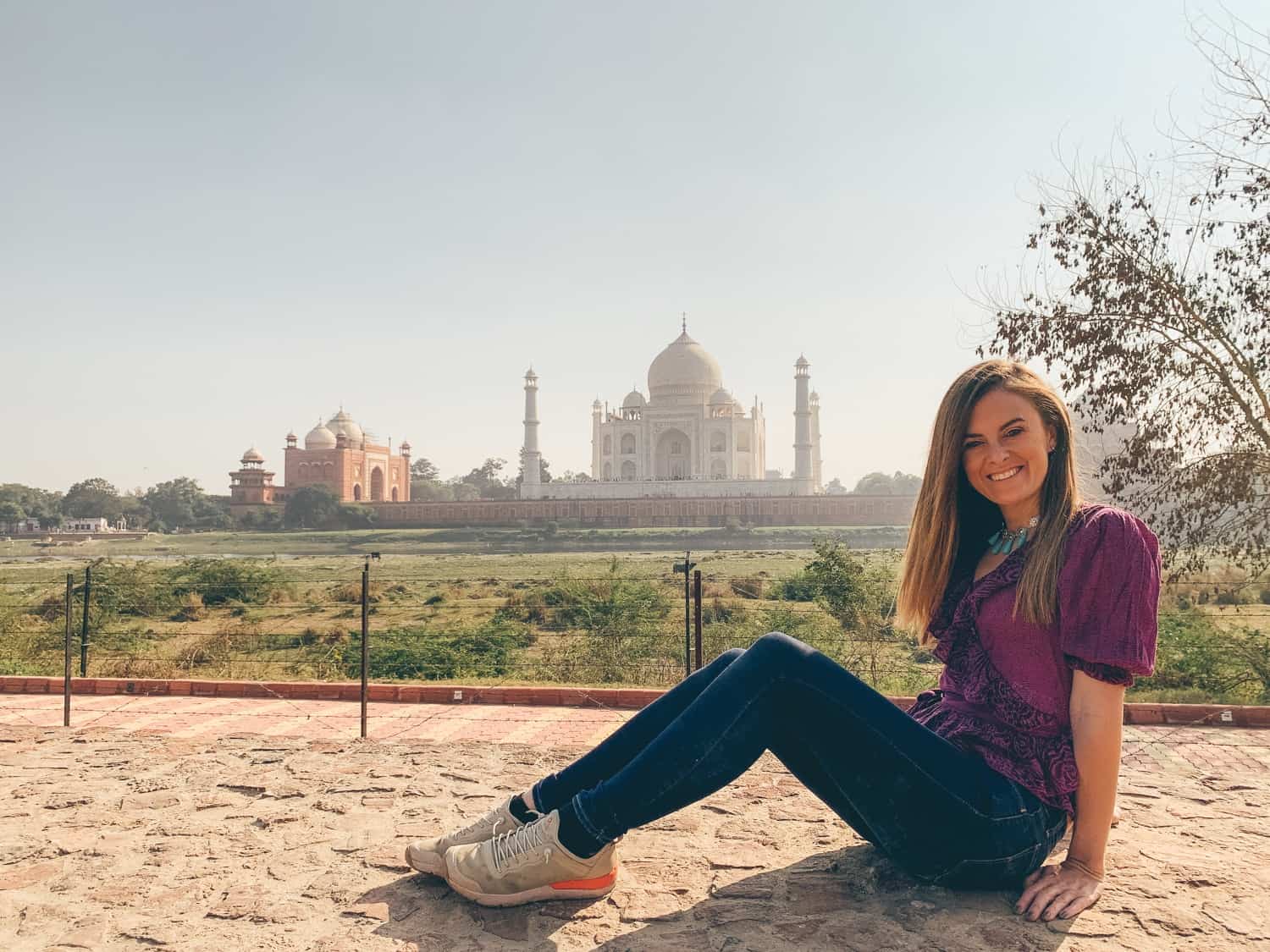 Girl in front of the taj mahal