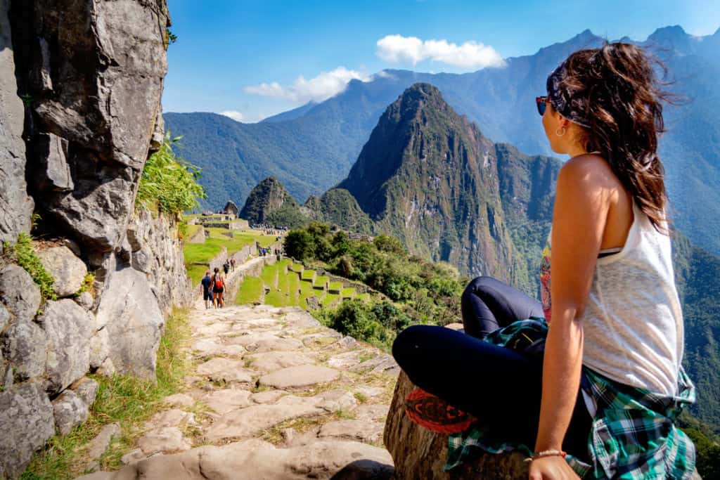 girl overlooking machu picchu