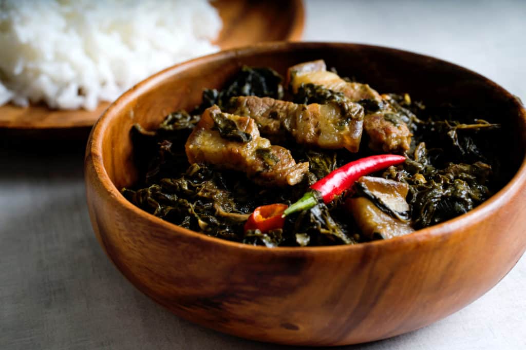 Laing is a Filipino dish of shredded taro leaves with meat or seafood, cooked in thick coconut milk with labuyo chili, lemongrass, garlic, shallots, ginger, and shrimp paste