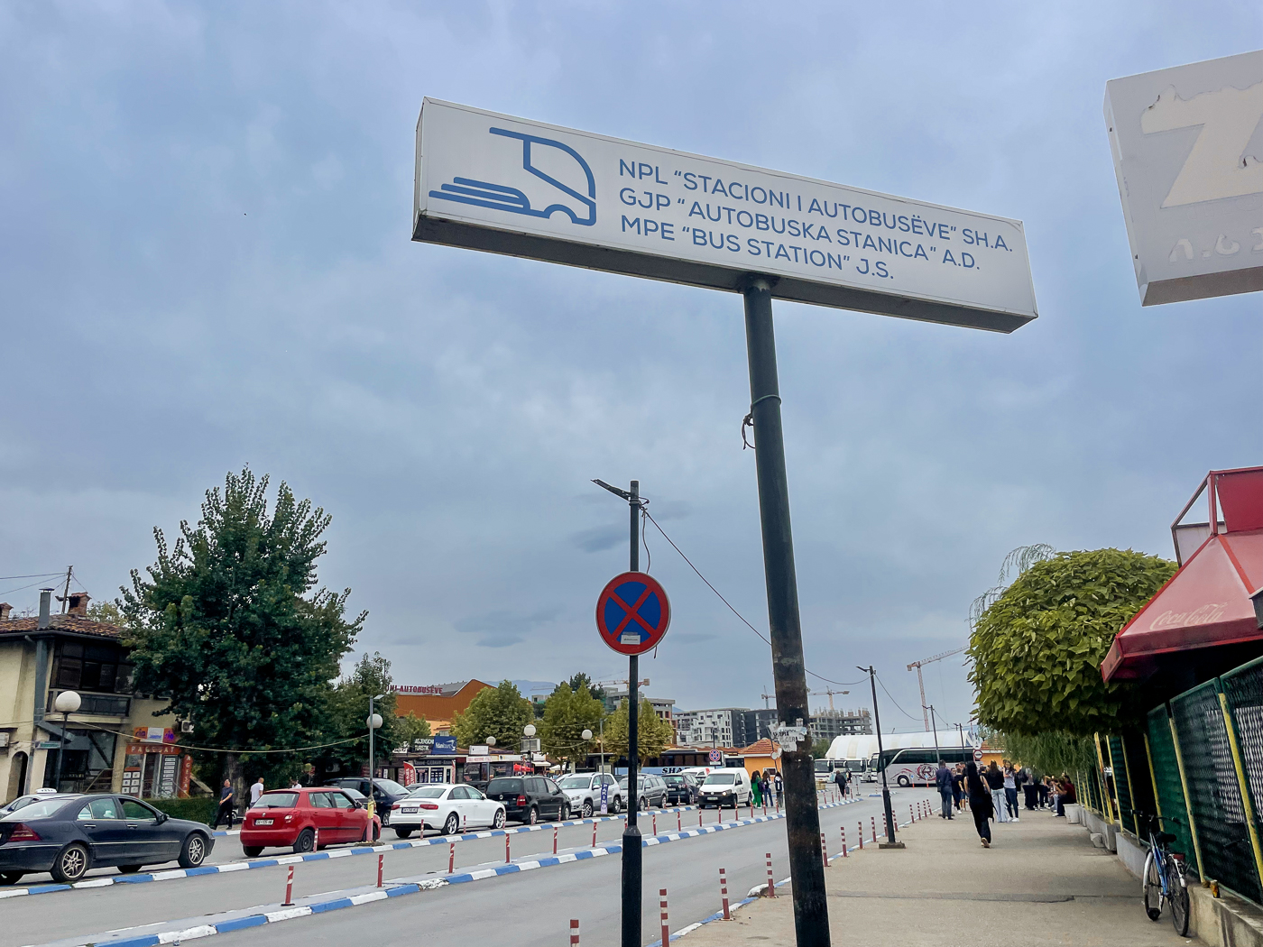 In Which I Attempt to Take a Day Trip to Kosovo Prizren bus station sign